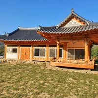 전주의봄펜션 로고