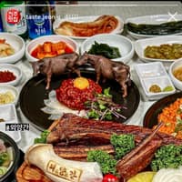 외양간 본점 로고